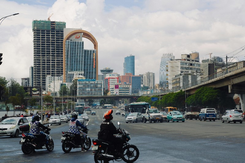 Motorcyclists cross an intersection in Addis Ababa.